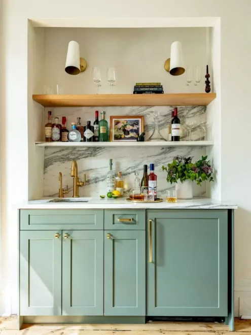 sage green coffee bar with wooden slack