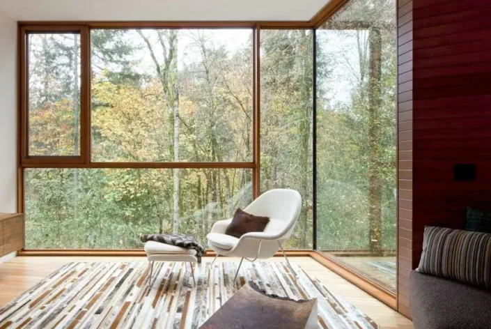 Large open Window for Freash Air in Cullen House in Portland Oregon with White Chair in middle